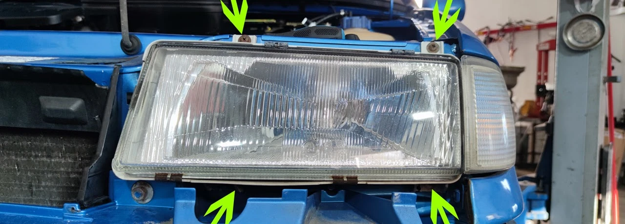 Four headlight mounting screws