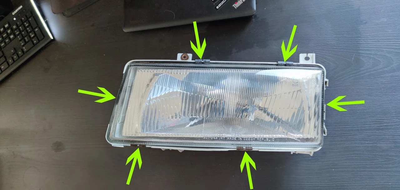 Metal clips holding the headlight lens
